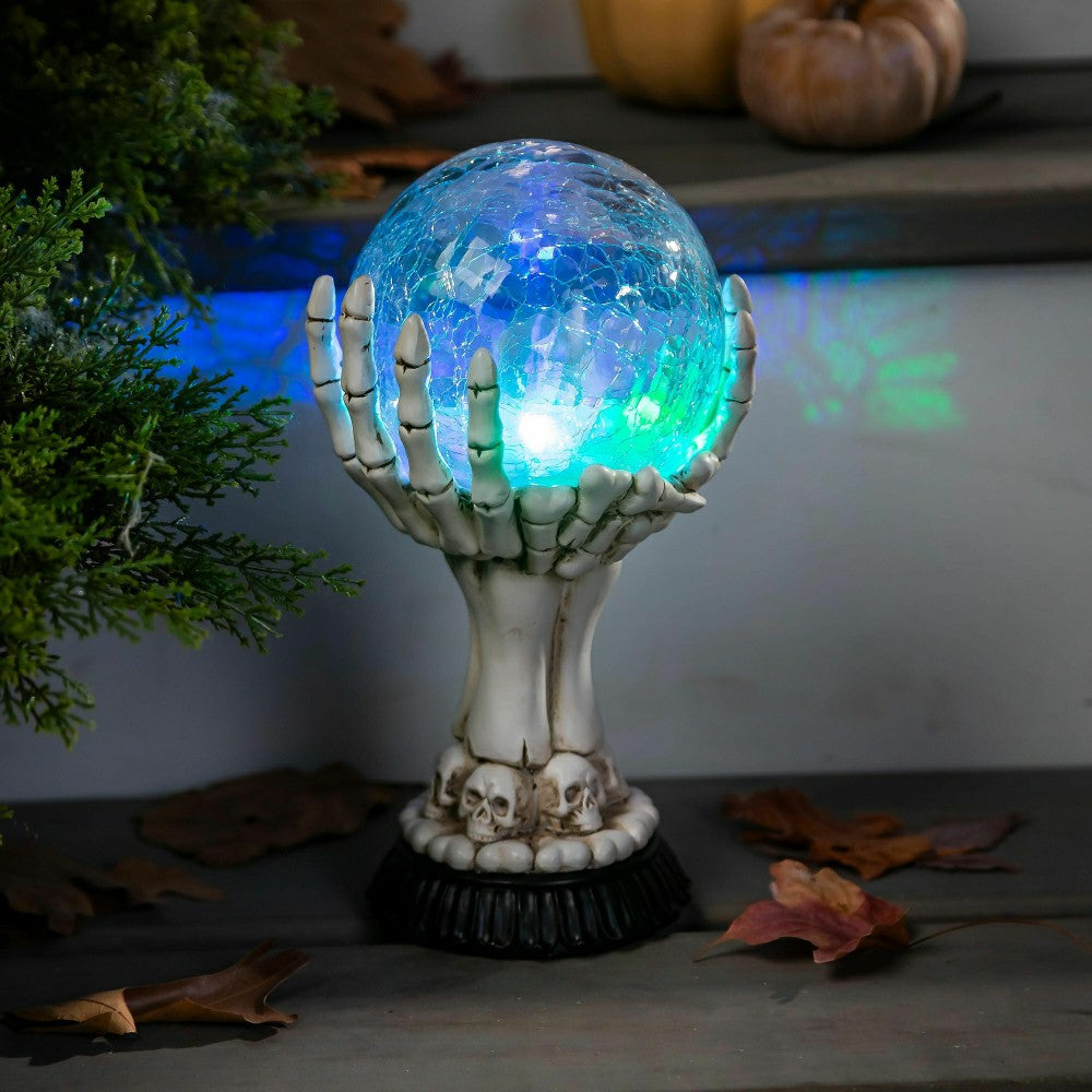 Haunted House LED Skull Hand Globe Statuary | Plow & Hearth