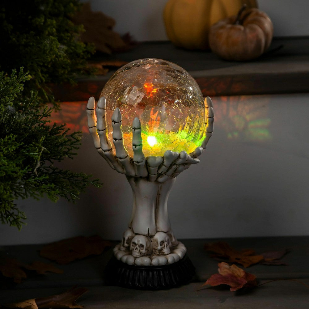 Haunted House LED Skull Hand Globe Statuary | Plow & Hearth